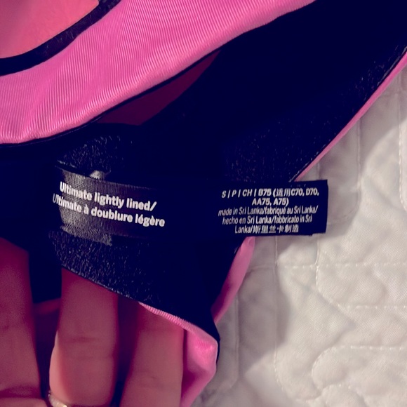 Victoria Secret Sports Bra size small and medium but both fit about the same. - Picture 6 of 6